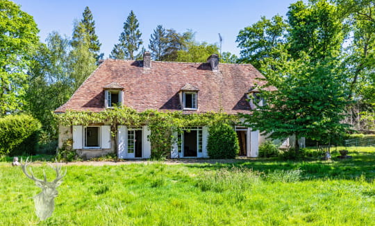 Demeure de caractère avec un grand garage de 190 m² au sol